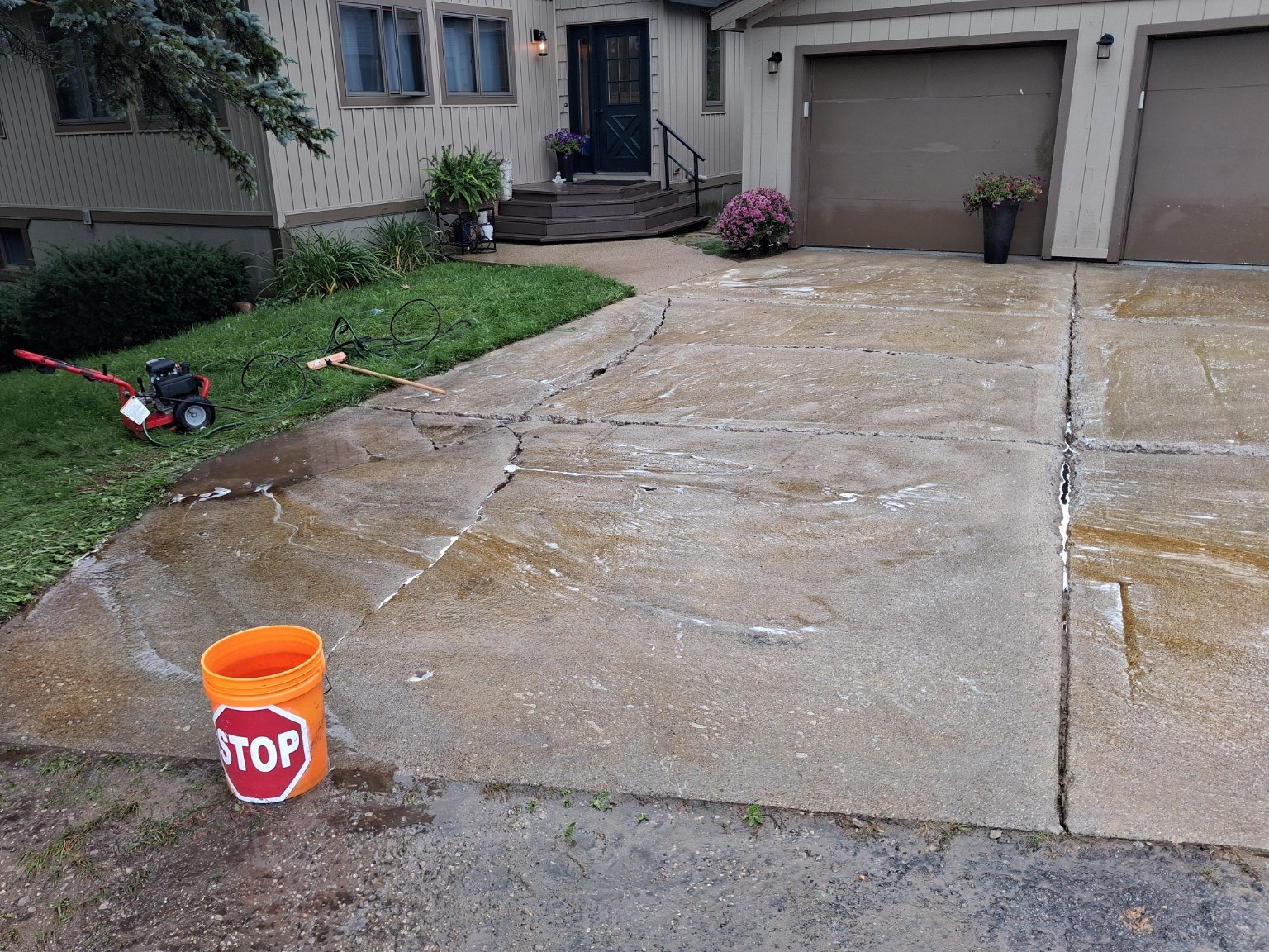 Concrete driveway during cleaning